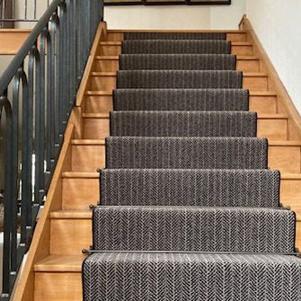 Re-styled wood staircase with balladeer stair rods in antique bronze