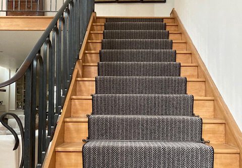 Re-styled wood staircase with balladeer stair rods in antique bronze