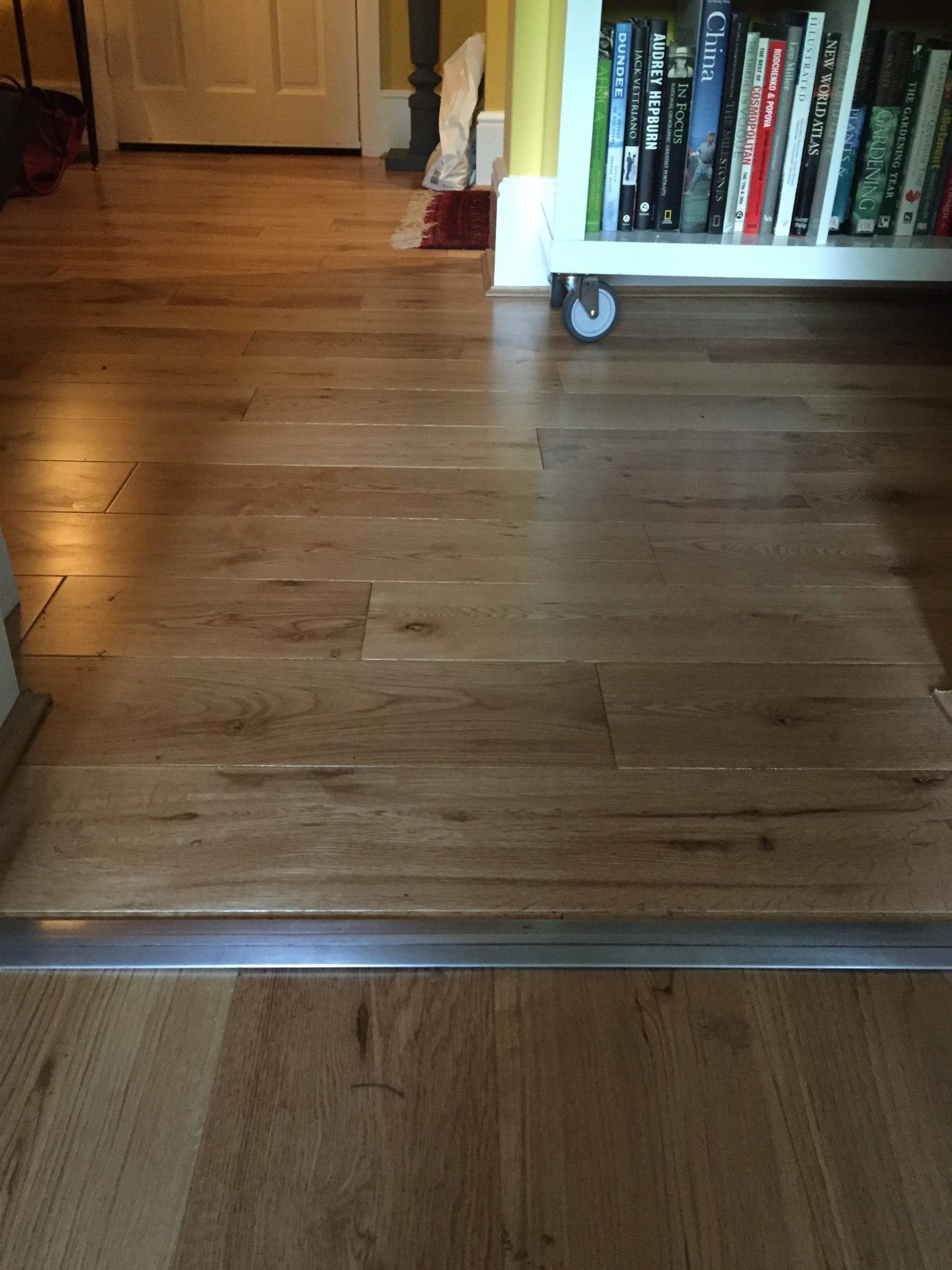 Premier Posh room dividing strip between wood floors