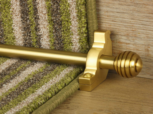 Sphere stair rods polished brass on green striped runner