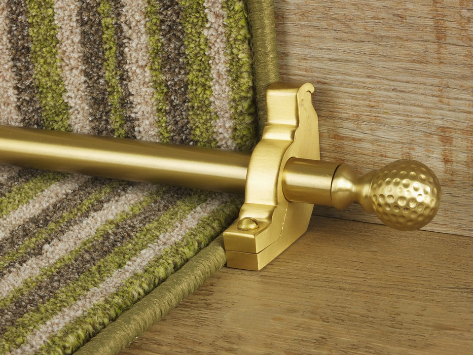 Extra large Dune stair rods on striped carpet