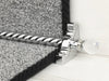 Crystal ended stair rods with chrome trim on grey fleck stair runner