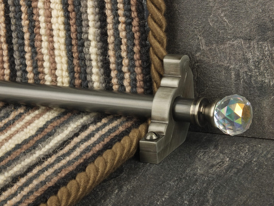 Crystal ended stair rods with chrome trim on grey fleck stair runner