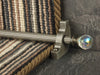 Crystal ended stair rods with chrome trim on grey fleck stair runner